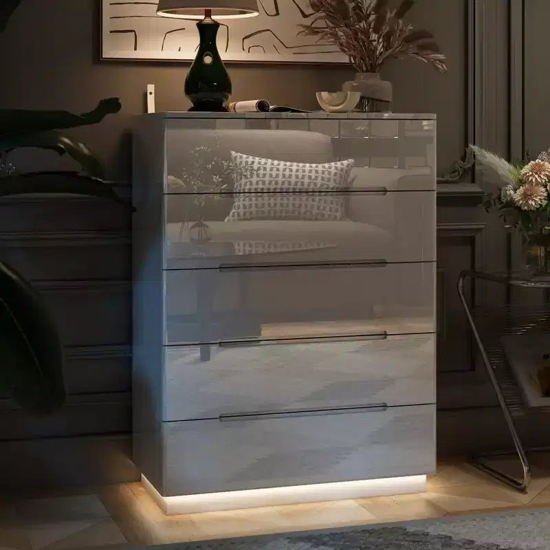 Commode 5 tiroirs laquée brillante avec éclairage sous le meuble, poignée dissimulée