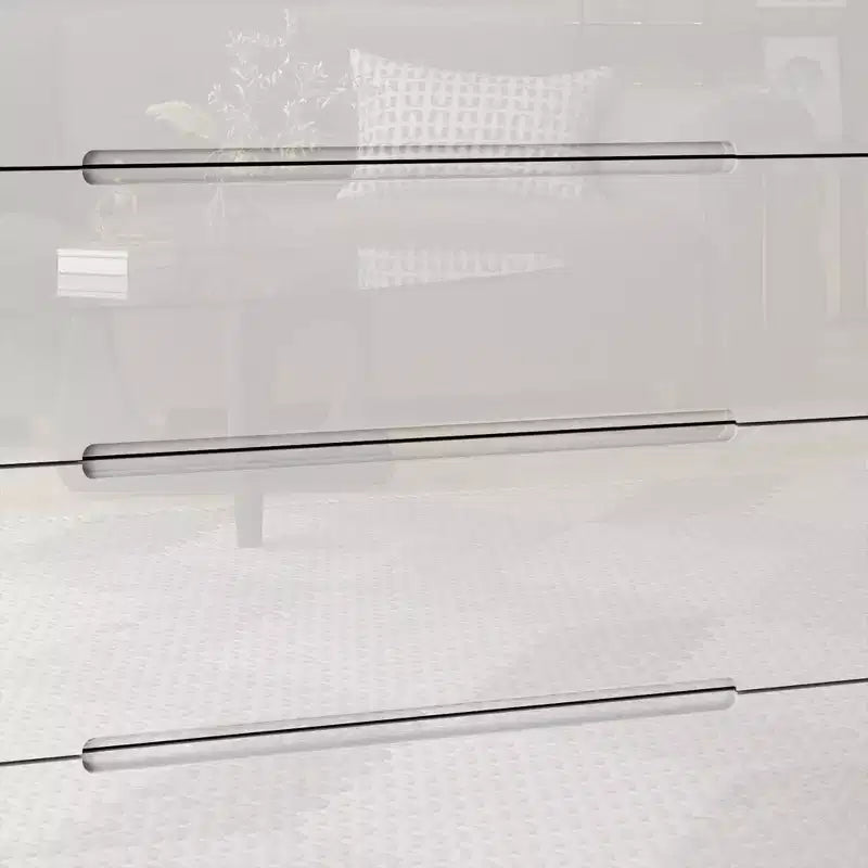 Commode 5 tiroirs laquée brillante avec éclairage sous le meuble, poignée dissimulée