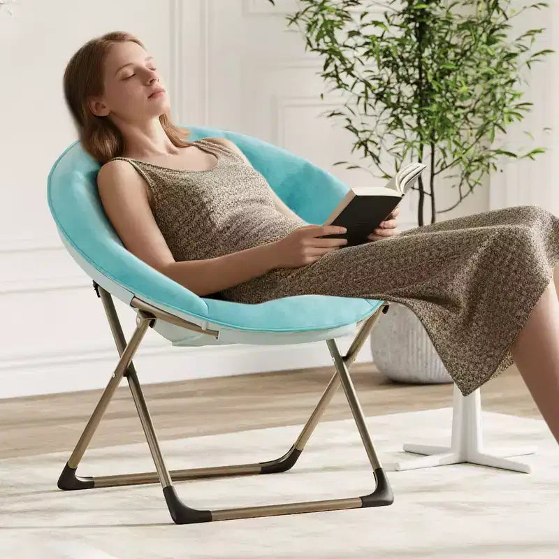 Fauteuil soucoupe pliant en fausse fourrure, assise épaisse et moelleuse, cadre métallique