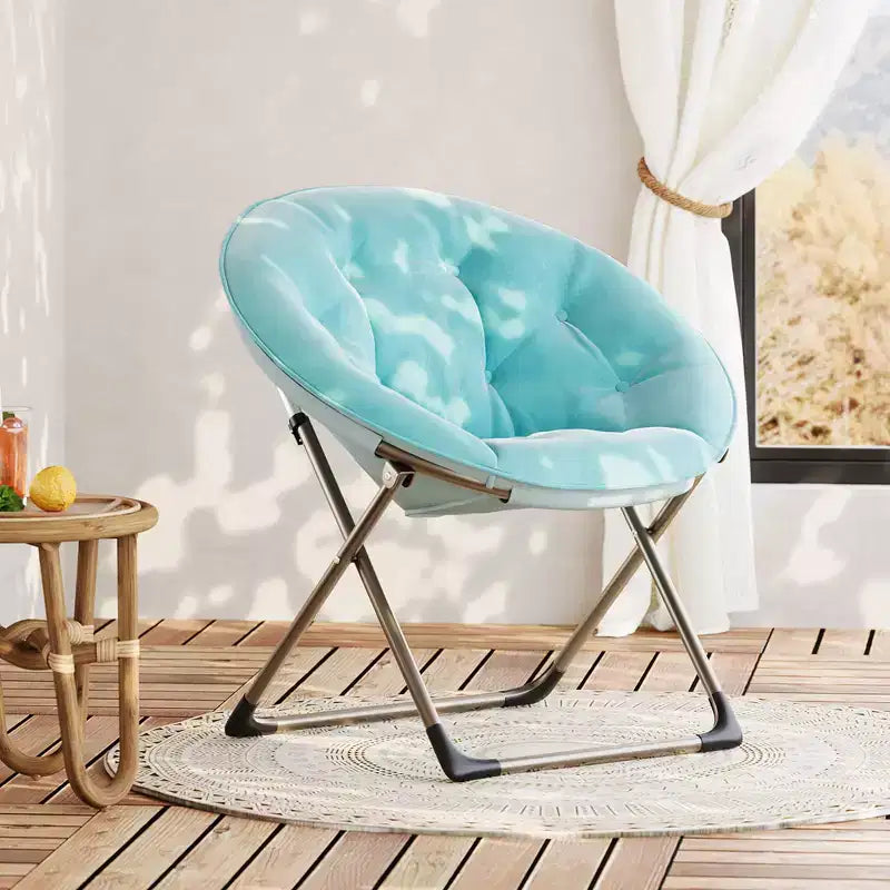 Fauteuil soucoupe pliant en fausse fourrure, assise épaisse et moelleuse, cadre métallique