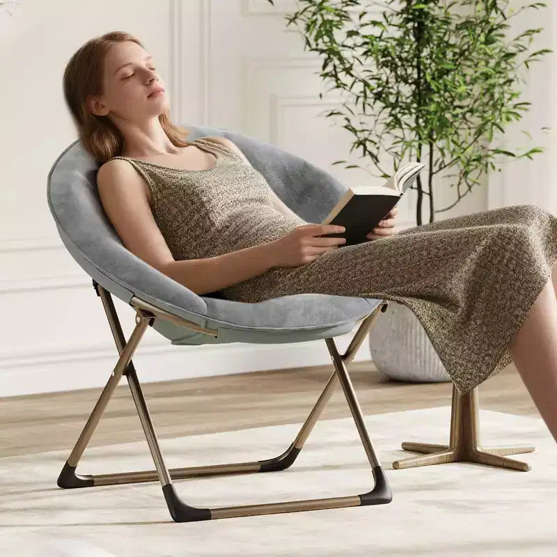 Fauteuil soucoupe pliant en fausse fourrure, assise épaisse et moelleuse, cadre métallique